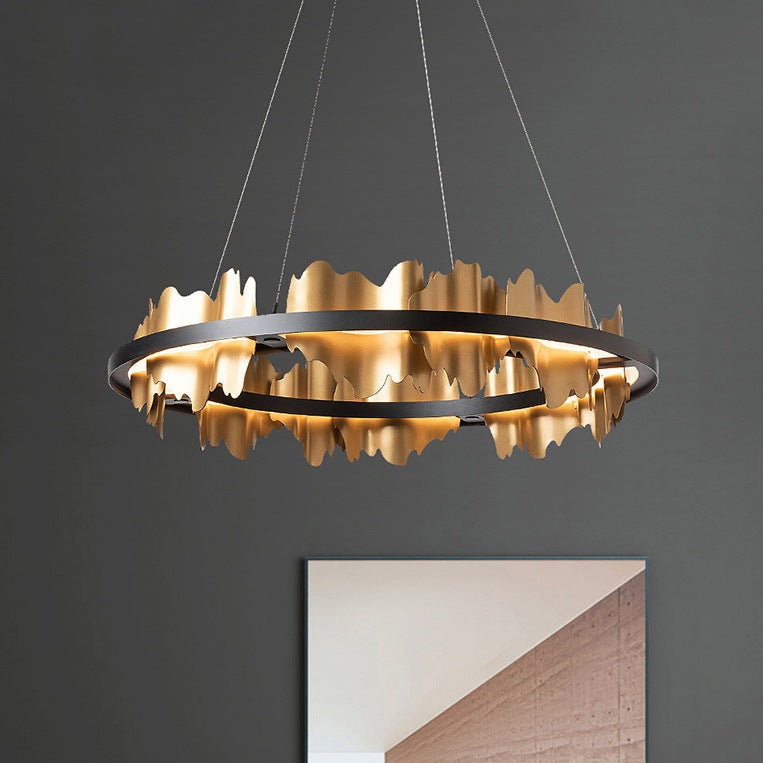 Solara Chandelier in gold with sculptural metal design — modern luxury lighting by Rubina Interiors.